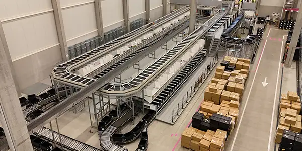 Dual Split Tray Sorter – Fashion Logistics I DistriSort & Norah